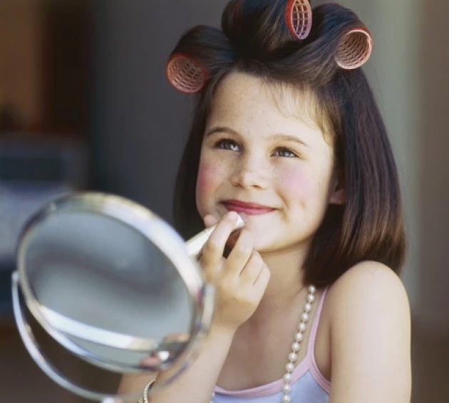 Portrait of a girl with curlers in her hair Portrait of a girl with curlers in her hair